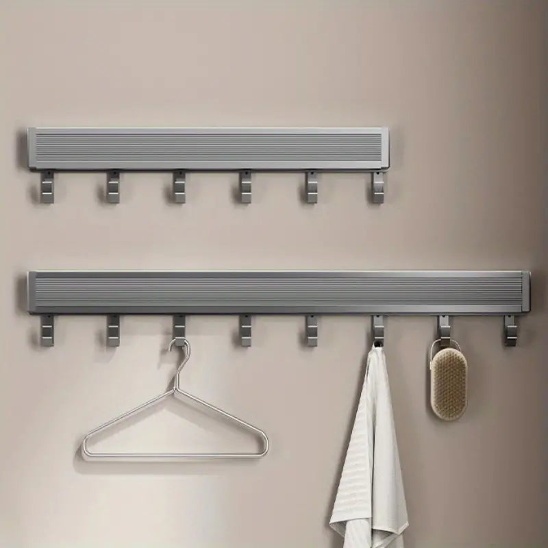 Foldable invisible bathroom towel rack