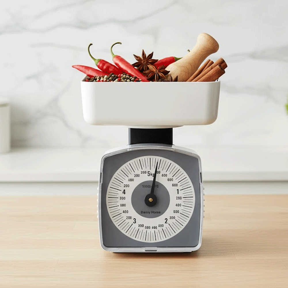 ميزان ميكانيكي مع وعاء