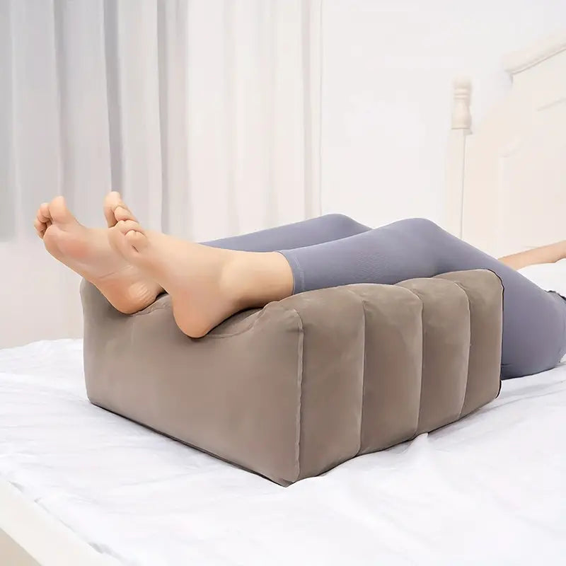 Inflatable leg lift pillow